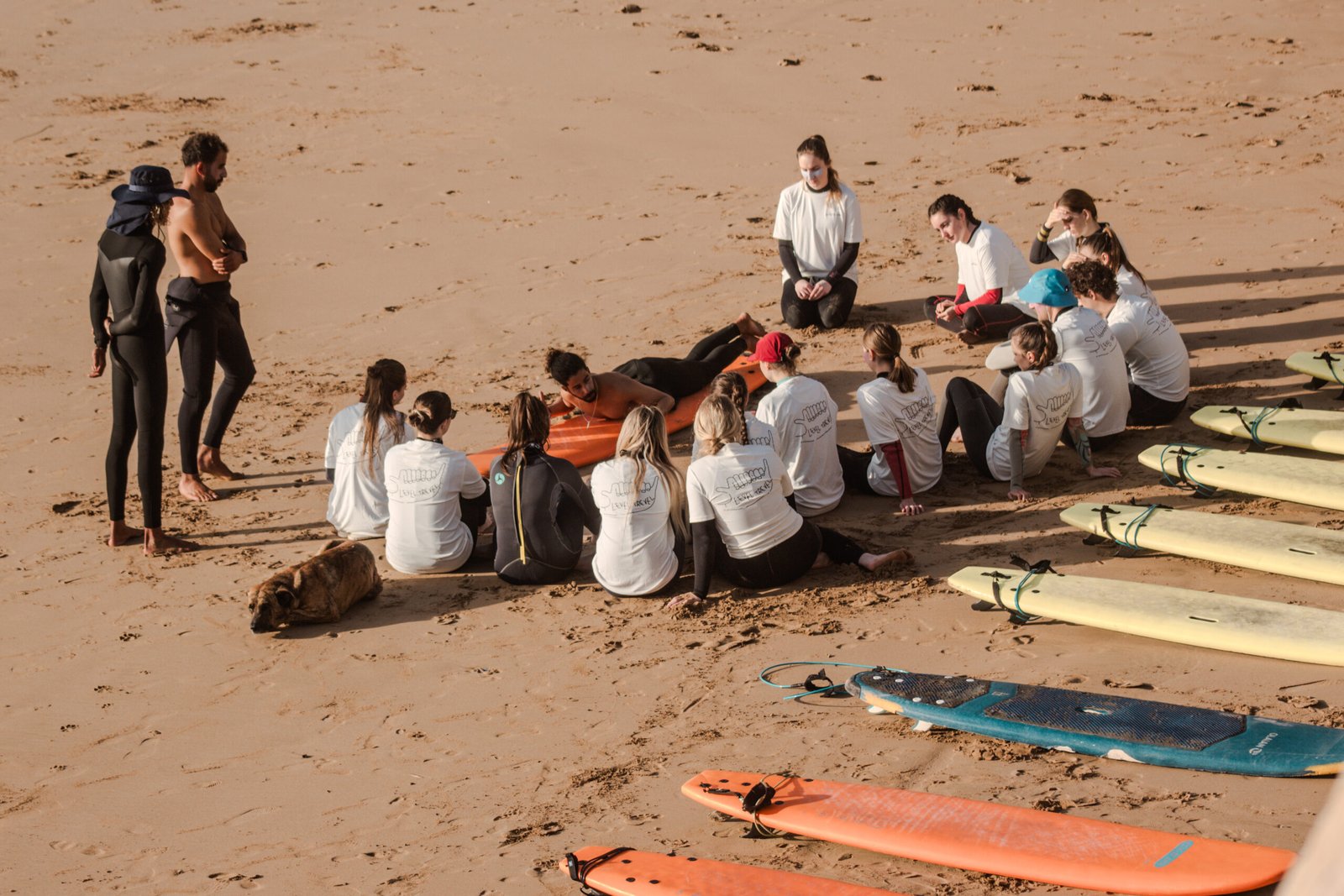 Surf students and coaches preparing for a lesson in Imsouane